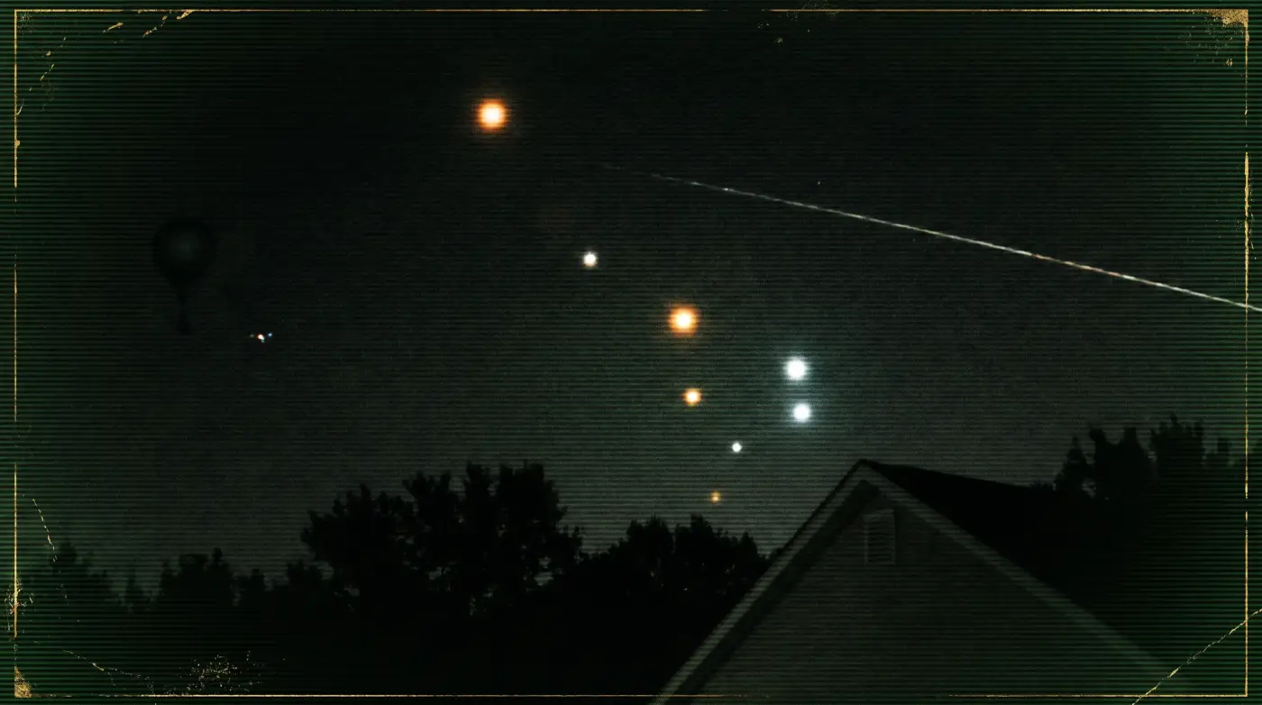 Bright orb-like light above a dark horizon